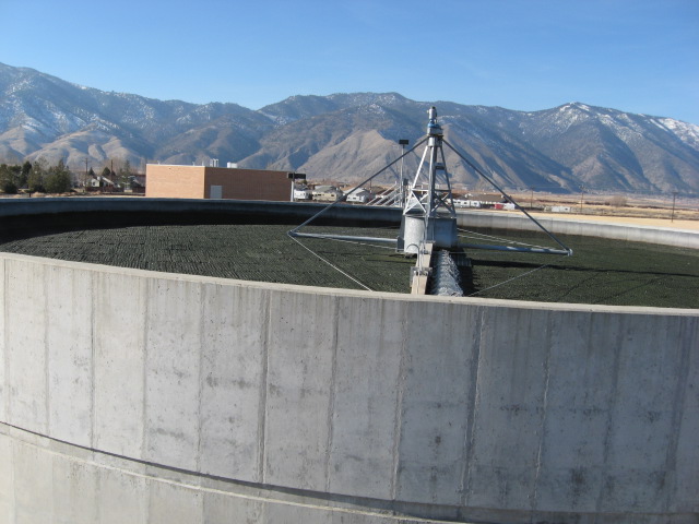 Trickling Filter <br> Primary effluent is conveyed  to the Trickling Filters where the flow is distributed onto the filter media, providing biologicial treatment of primary effluent. <br> Simple, yet effective technology.